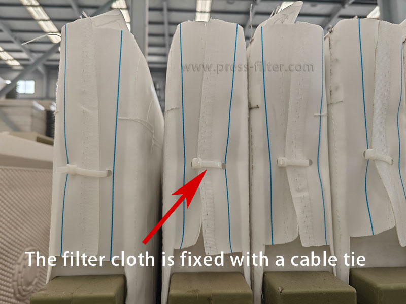 The filter cloth is fixed with a cable tie